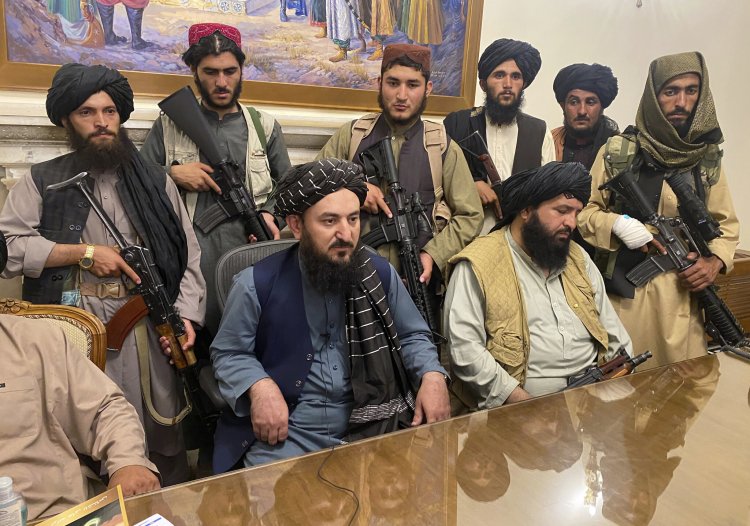 Taliban fighters after taking control of the presidential palace
