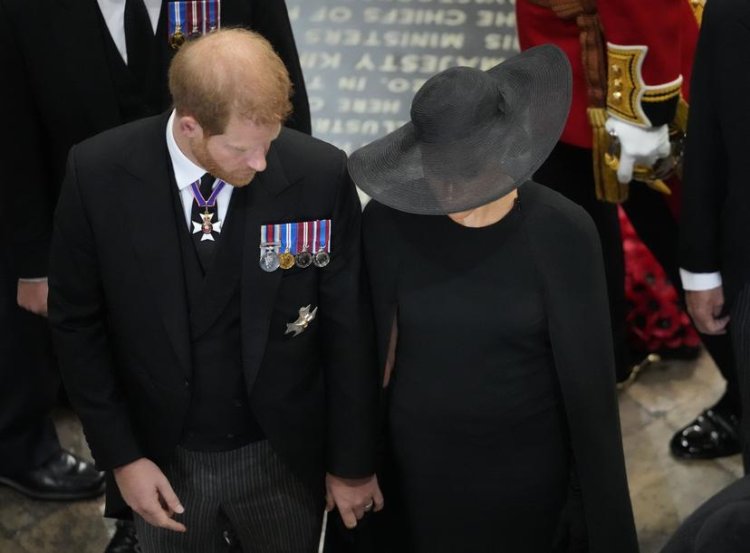 Prince Harry & Meghan Pictured Holding Hands At Queen Elizabeth II's Funeral